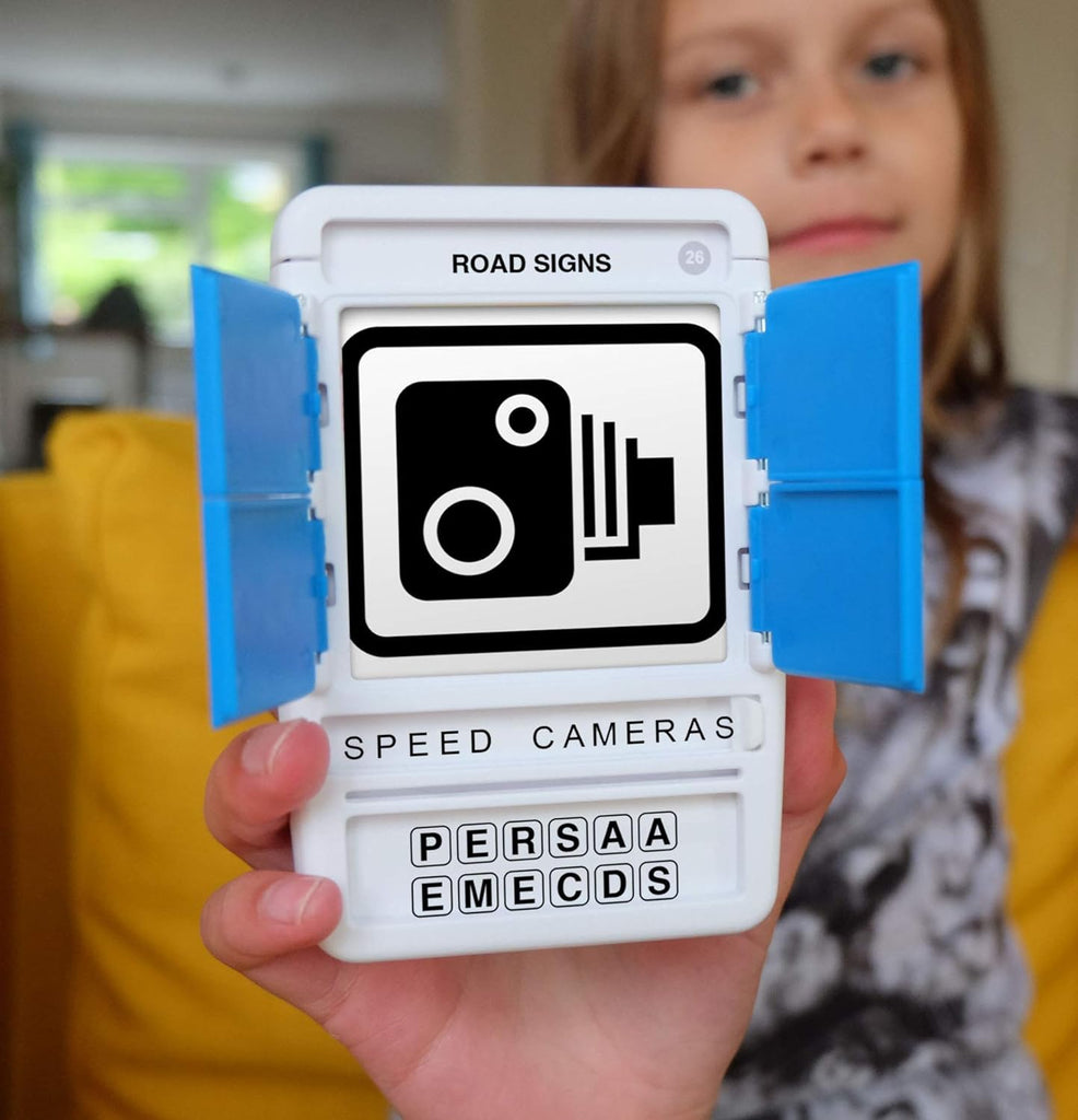 A girl holding road sign game with a sign speed camera on road