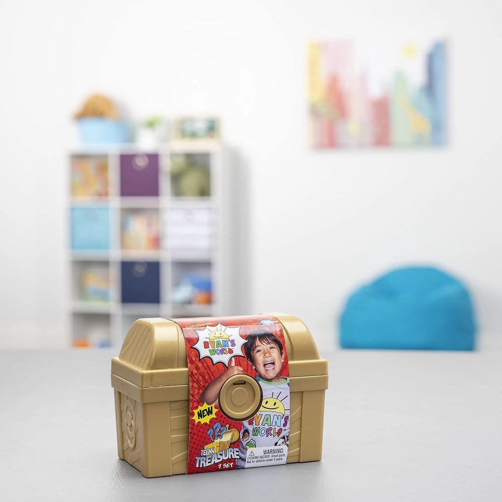 Toy treasure chest with a colorful label featuring a child's face in a room setting.