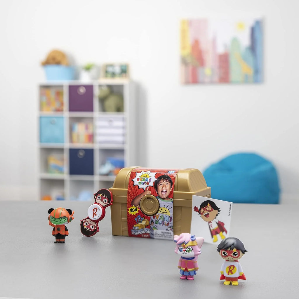 Toy figures and packaging on a table with a blurred background