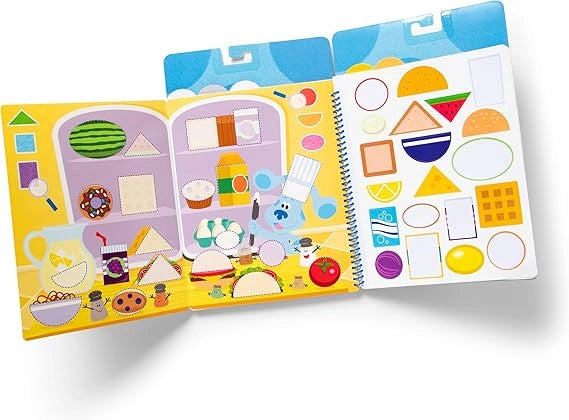 Children's educational book with colorful shapes and pictures on a white background