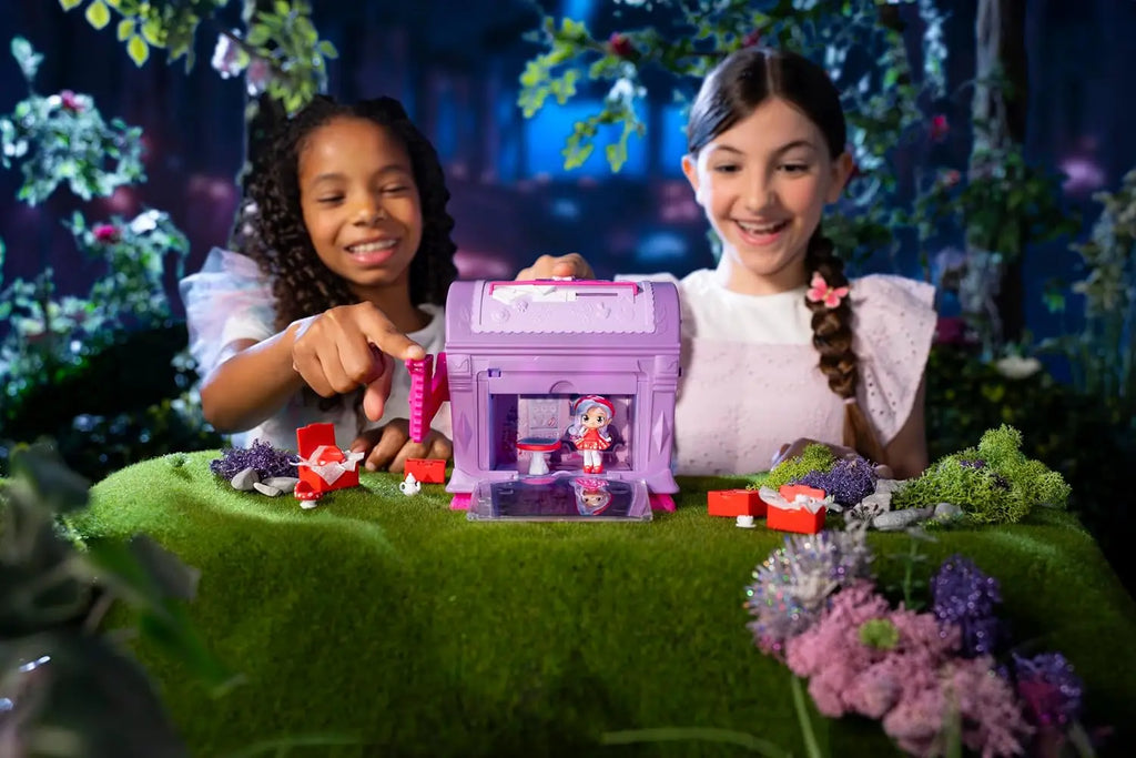 Girls playing with SECRET FINDEES PINK MAGIC MAILBOX PLAYSET