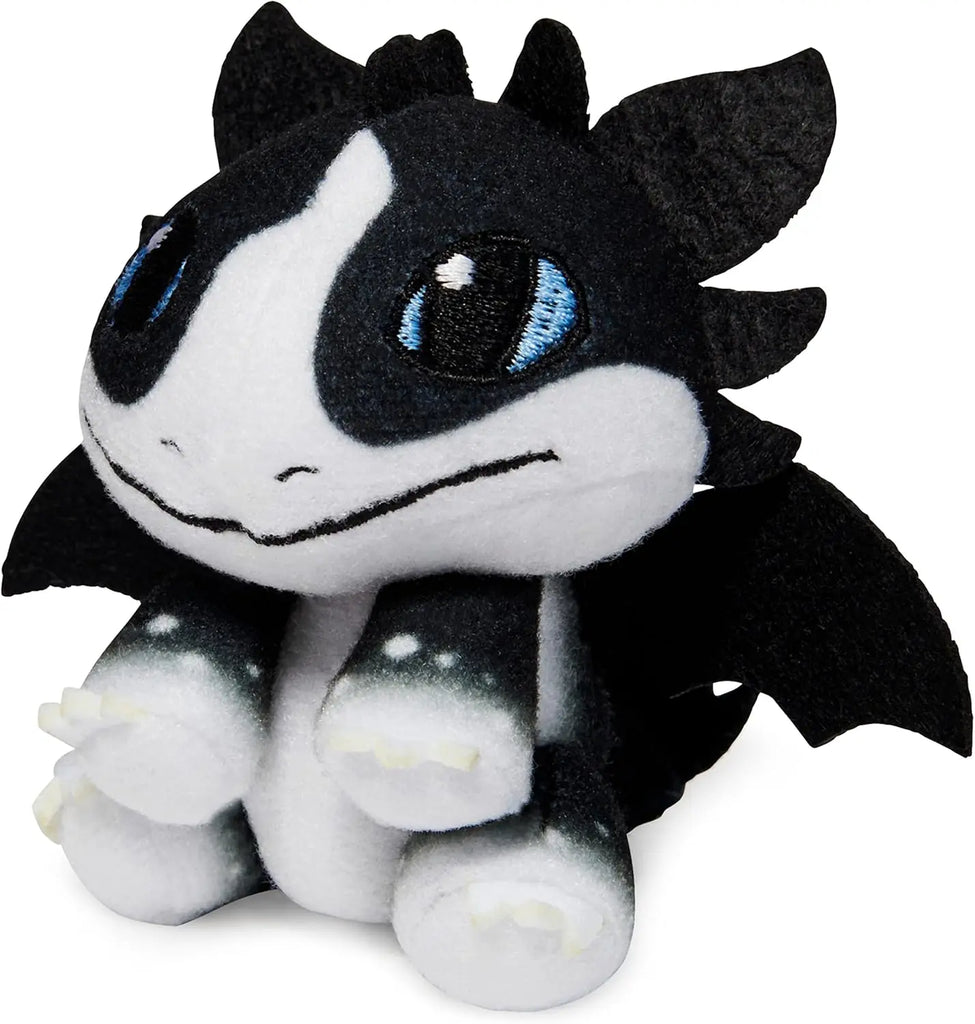 Plush toy dragon with black and white color scheme on a white background