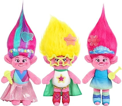 Three colorful troll dolls with different hairstyles and outfits on a white background