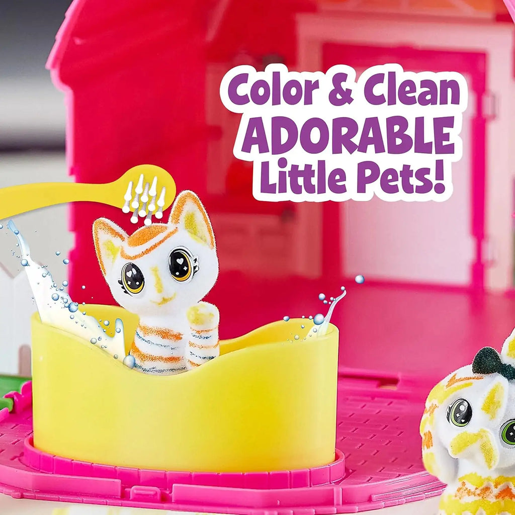 Toy cat in a yellow bath with pink background and text promoting 'Color & Clean ADORABLE Little Pets'.