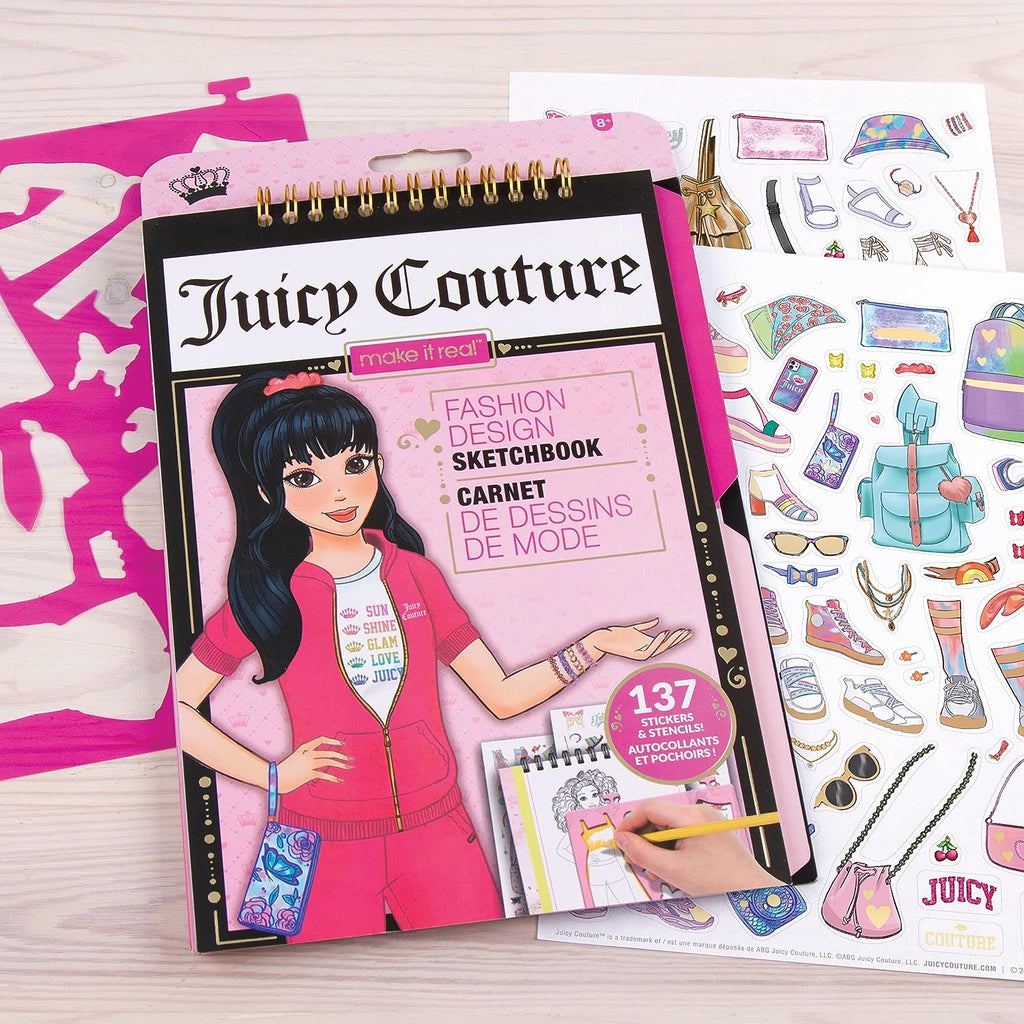 Close-up of fashion sketchbook cover featuring Juicy Couture branding.