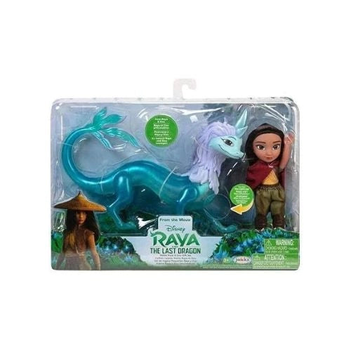 Toy figure of a girl with a dragon in packaging, featuring Disney's 'Raya and the Last Dragon'.